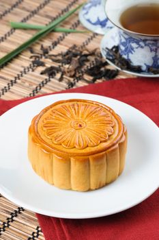 Mooncake on bamboo mat, Chinese Mid-autumn festival dessert