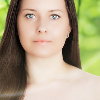 Beauty portrait of young woman for natural skincare and cosmetic brand, spring nature on background as wellness, health and organic beauty concept.