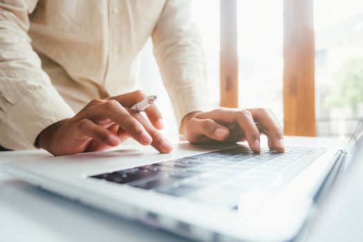 Man using computer, online search, online learing , online working, computer coding programming.