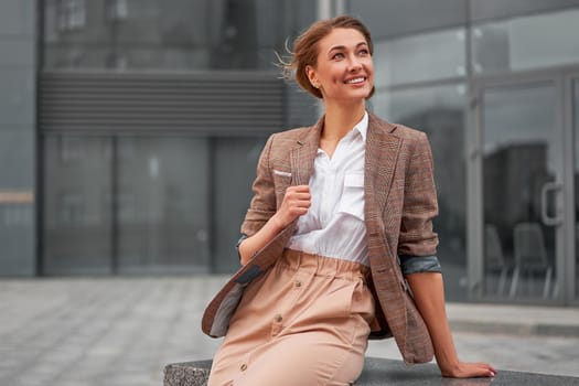Businesswoman successful woman business person standing outdoor corporate building exterior Smile happy caucasian confidence professional business woman middle age female entrepreneur Bank employee
