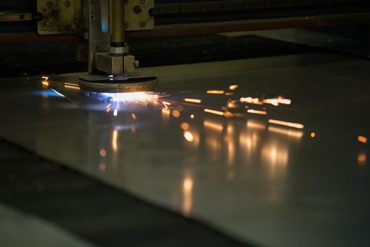 Plasma cutting of metal.Cutting of metal. Sparks fly from laser
