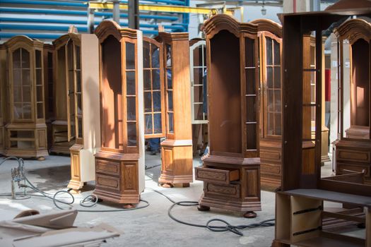 Furniture manufacture from a natural tree.Furniture manufacture. Factory for the manufacture of expensive furniture. To do cabinets. Wood processing in furniture