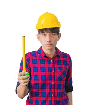 hand of engineer is holding tape measure in his hands and wear yellow safety helmet plastic on white background. construction concept