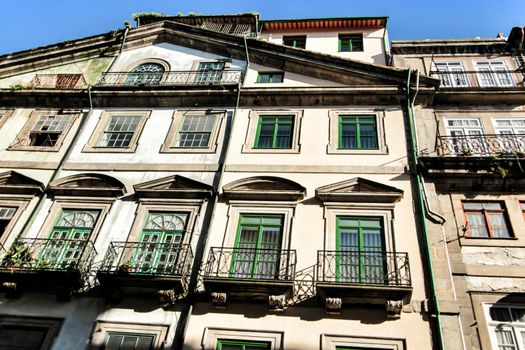 Beautiful and old colorful tiled facades in Porto city in January