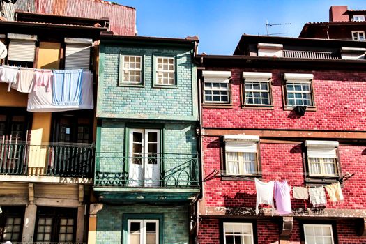Beautiful and old colorful tiled facades in Porto city in January
