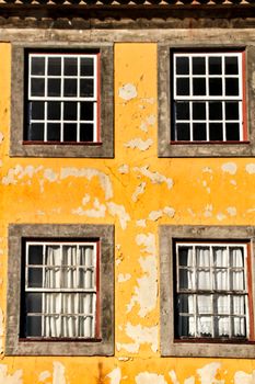Beautiful and old colorful tiled facades in Porto city in January