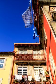 Beautiful and old colorful tiled facades in Porto city in January