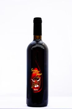 Bottle of Sange de Taur wine isolated on white. Illustrative editorial photo shot in Bucharest, Romania, 2021