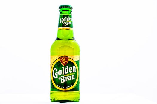 Bottle of Golden Brau beer isolated on white. Illustrative editorial photo shot in Bucharest, Romania, 2021