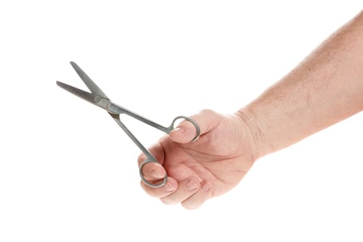 Hand holds medical scissors on a white background, template for designers. Close up