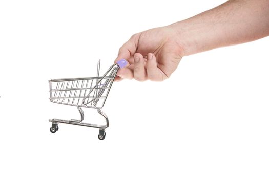 Hand holds a trolley from a supermarket on a white background, template for designers.