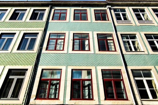 Beautiful and old colorful tiled facades in Porto city in January