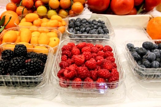 Colorful and tasty tropical Fruits for sale at a market stall at the provisional market of Bolhao in Oporto