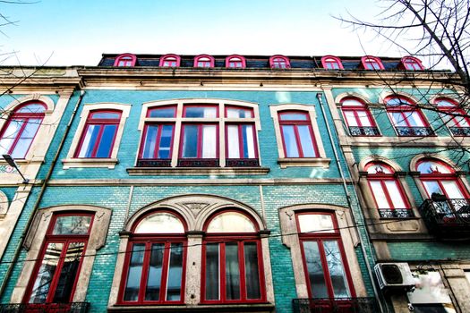 Beautiful and old colorful tiled facades in Porto city in January