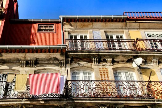 Beautiful and old colorful tiled facades in Porto city in January