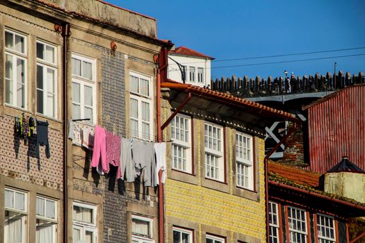 Beautiful and old colorful tiled facades in Porto city in January