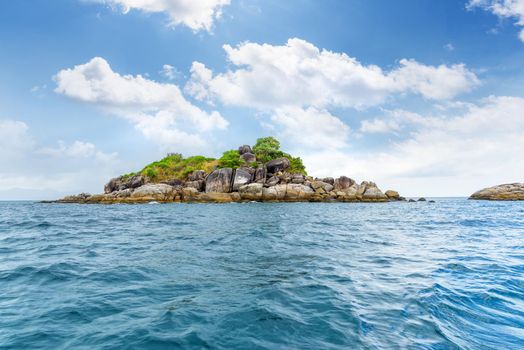 Beautiful nature landscape of Ko Hin Sorn small island with surprisingly overlap rocks in the Andaman Sea and sky in summer attractions near Koh Lipe at Tarutao National Park, Satun, Thailand