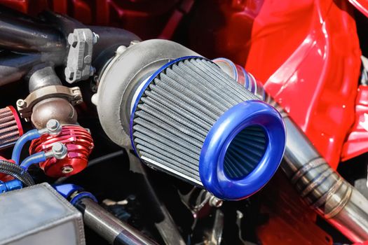 Air filter with turbocharger in racing car engine