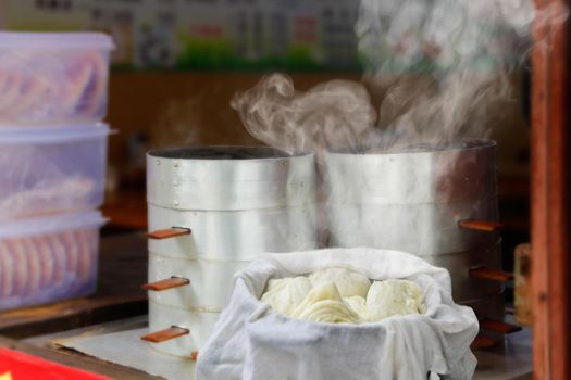 Chinese steamed buns stuffed or baozi in Dali market ,Yunnan China.