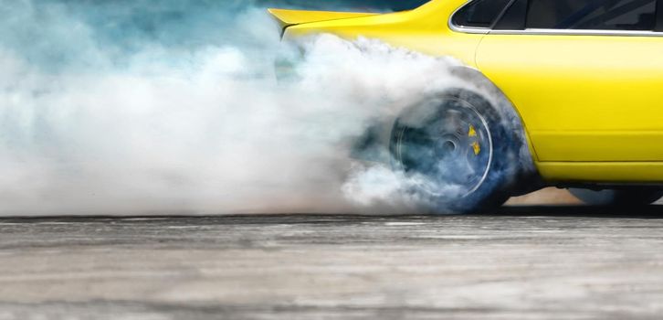 Race drift car burning tires on speed track