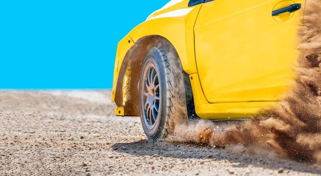 Rally racing car on dirt track.