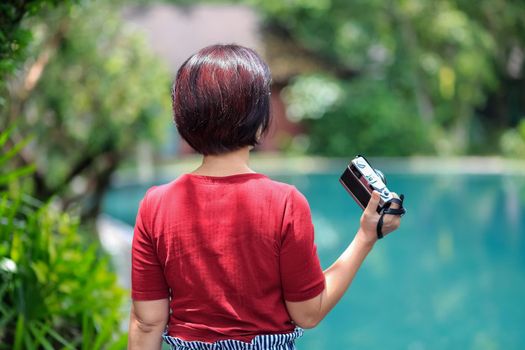 Solo travel female tourist relaxing in hotel  resort