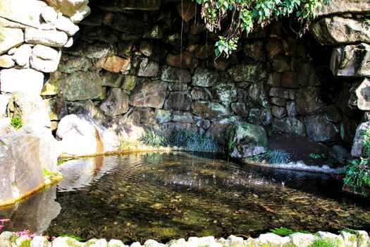 Oporto, Portugal- January 6, 2020: Beautiful pond in the Idyllic Crystal Palace Garden in Oporto, Portugal