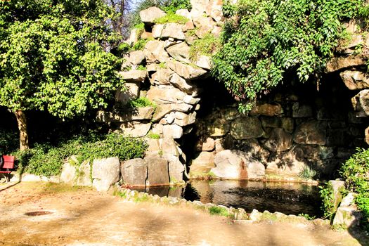 Oporto, Portugal- January 6, 2020: Beautiful pond in the Idyllic Crystal Palace Garden in Oporto, Portugal