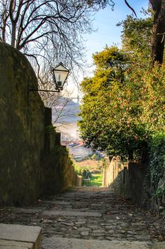 Oporto, Portugal- January 6, 2020: Stone staircase in the Beautiful and Idyllic Crystal Palace Garden in Oporto, Portugal