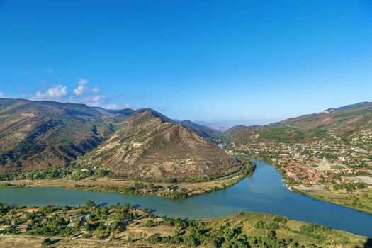 View of Kura and Aragvi rivers merge from hill with Jvari Monastery, Georgia