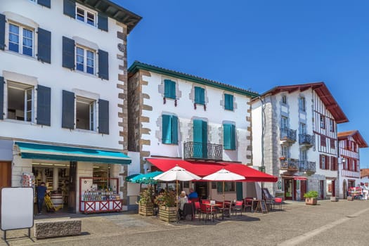 Street with historical houses in  Espelette, Pyrenees-Atlantiques, France