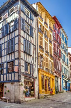 Street with historical houses in Bayonne city center, France