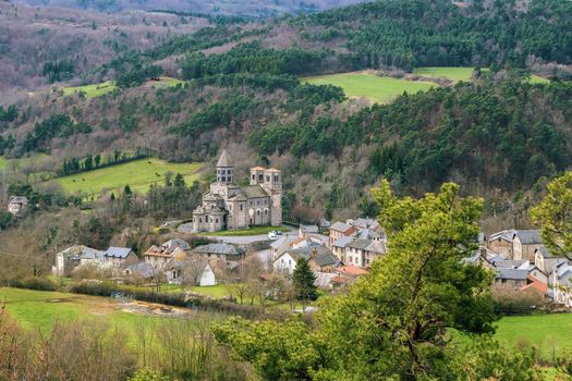 Landscape in Auvergne region with Saint-Nectaire Church, France