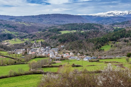 Landscape in Auvergne region with Saint-Nectaire Church, France