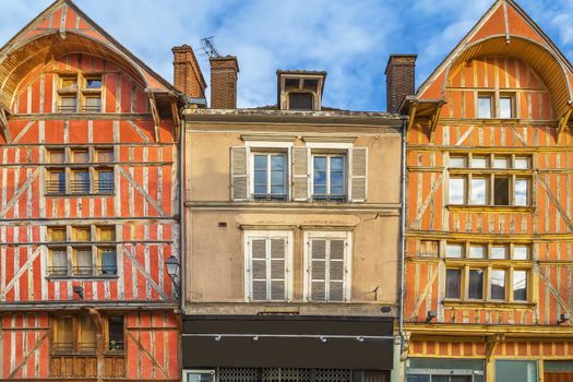 Street with historical half-timbered houses in Troyes, France