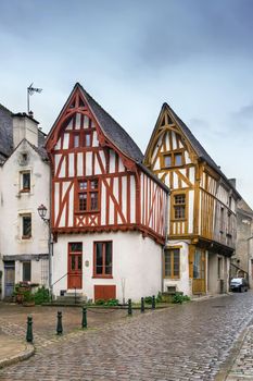 Street with historical half-timbered houses in Noyers (Noyers-sur-Serein), Yonne, France