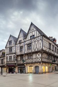 Street with historical half-timbered houses in Dijon, France