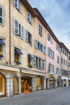 Street with historical houses in Annecy old town, France