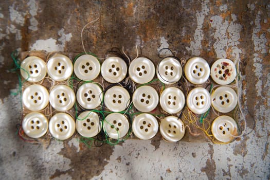 Presentation of old buttons used for clothes and dresses