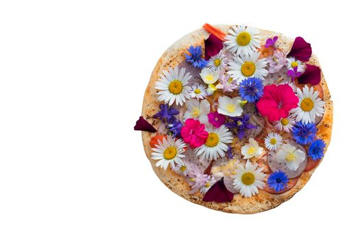 Creative pizza covered with colorful flowers.Piece of creative pizza