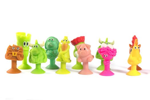 Bonstiki. A group of small rubber toys on a white background.