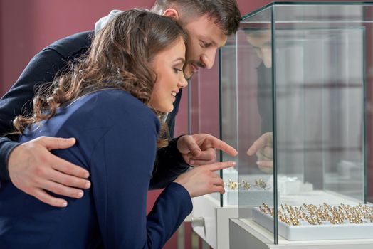 I see the one I want Shot of a young woman shopping jewelry with her loving boyfriend