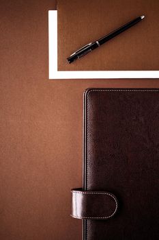 Productivity, work and corporate lifestyle concept - Vintage business briefcase on the office table desk, flatlay background