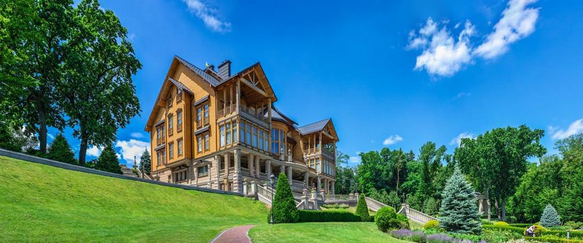 Kyiv, Ukraine 07.10.2020. Honka or the main wooden house in the Mezhyhirya Residence, Kyiv, Ukraine, on a sunny summer day