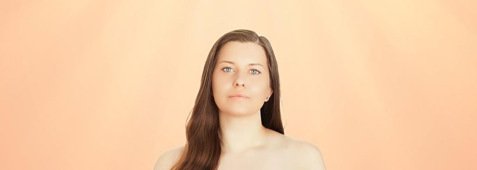 Sunny face portrait of young woman, suntan skin tone and beauty cosmetics. Beautiful brunette female model with natural tan using sunscreen product.