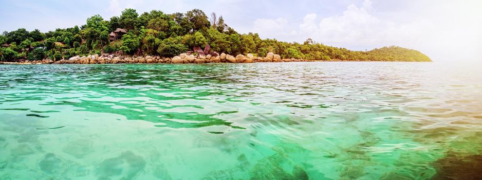 Panorama beautiful nature landscape resort on Koh Lipe island surrounded by clear green sea overlook the coral reef under the evening sunlight during sunset, Tarutao National Park, Satun, Thailand