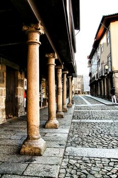 Beautiful streets and old stone facades of the portuguese medieval village of Guimaraes at Christmas