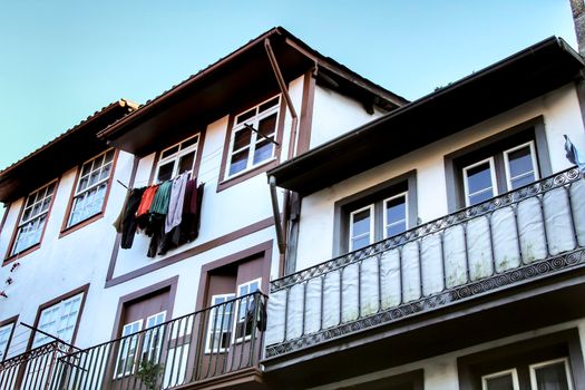 Beautiful streets and old stone facades of the portuguese medieval village of Guimaraes at Christmas