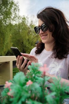 Girl with a smartphone in her hands.