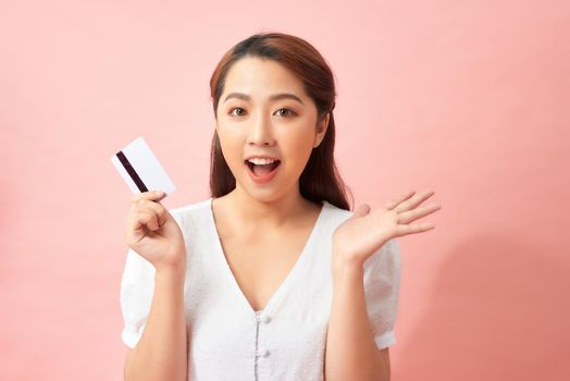 woman shows her credit card ,asia beauty